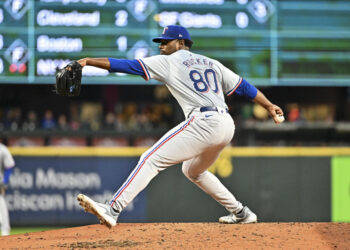 SEATTLE, WASHINGTON - SEPTEMBER 12: Kumar Rocker #80 of the Texas Rangers, making his MLB debut, throws a pitch during the third inning against the Seattle Mariners at T-Mobile Park on September 12, 2024 in Seattle, Washington. (Photo by Alika Jenner/Getty Images)