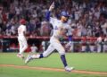 Anaheim, California September 3, 2024-Dodgers Mookie betts celebrates his three-run home run against the Angels in the tenth inning at Anaheim Stadium Tuesday. (Wally Skalij/Los Angeles Times)