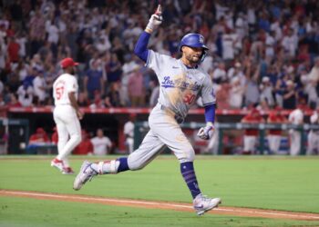 Anaheim, California September 3, 2024-Dodgers Mookie betts celebrates his three-run home run against the Angels in the tenth inning at Anaheim Stadium Tuesday. (Wally Skalij/Los Angeles Times)