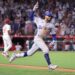 Anaheim, California September 3, 2024-Dodgers Mookie betts celebrates his three-run home run against the Angels in the tenth inning at Anaheim Stadium Tuesday. (Wally Skalij/Los Angeles Times)