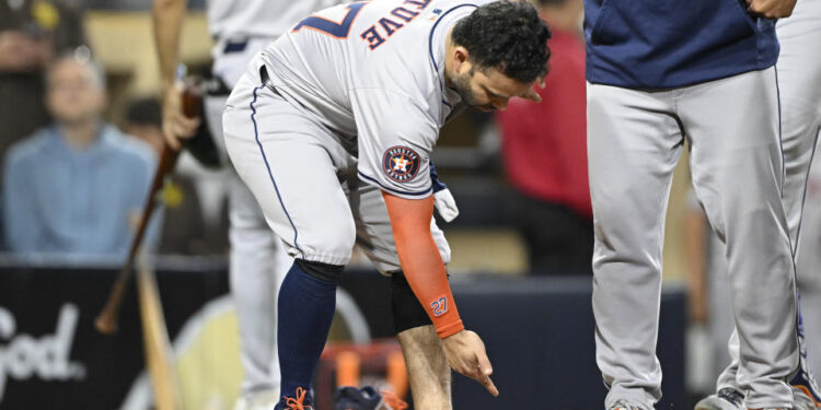 SAN DIEGO, CA - SEPTEMBER 17: Jose Altuve #27 of the Houston Astros points to his foot after grounding out during the ninth inning of a baseball game against the San Diego Padres at Petco Park on September 17, 2024 in San Diego, California. (Photo by Denis Poroy/Getty Images)