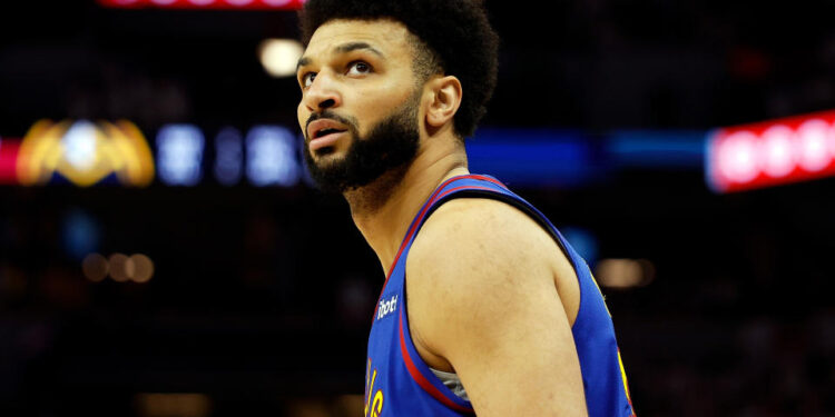 MINNEAPOLIS, MINNESOTA - MAY 10: Jamal Murray #27 of the Denver Nuggets looks on against the Minnesota Timberwolves in the first quarter of Game Three of the Western Conference Second Round Playoffs at Target Center on May 10, 2024 in Minneapolis, Minnesota. The Nuggets defeated the Timberwolves 117-90. (Photo by David Berding/Getty Images)