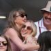 Taylor Swift and Brittany Mahomes embrace