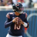 CHICAGO, ILLINOIS - SEPTEMBER 08: Caleb Williams #18 of the Chicago Bears looks to pass during a game against the Tennessee Titans at Soldier Field on September 08, 2024 in Chicago, Illinois.  The Bears defeated the Titans 24-17. (Photo by Stacy Revere/Getty Images)