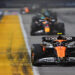 SINGAPORE, SINGAPORE - SEPTEMBER 22: Lando Norris of Great Britain driving the (4) McLaren MCL38 Mercedes leads Max Verstappen of the Netherlands driving the (1) Oracle Red Bull Racing RB20 on track during the F1 Grand Prix of Singapore at Marina Bay Street Circuit on September 22, 2024 in Singapore, Singapore. (Photo by Rudy Carezzevoli/Getty Images)