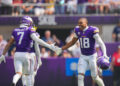 Sep 15, 2024; Minneapolis, Minnesota, USA; Minnesota Vikings wide receiver Justin Jefferson (18) celebrates an interception with cornerback Byron Murphy Jr. (7) against the San Francisco 49ers in the third quarter at U.S. Bank Stadium. Mandatory Credit: Brad Rempel-Imagn Images