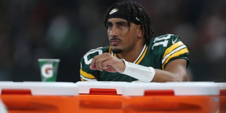 SAO PAULO, BRAZIL - SEPTEMBER 06: Jordan Love #10 of the Green Bay Packers receives treatment on the sideline during the fourth quarter against the Philadelphia Eagles at Arena Corinthians on September 06, 2024 in Sao Paulo, Brazil. (Photo by Wagner Meier/Getty Images)