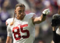 San Francisco 49ers tight end George Kittle (85) reacts to fans before an NFL football game against the Minnesota Vikings, Sunday, Sept. 15, 2024, in Minneapolis. (AP Photo/Abbie Parr)