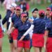 Megan Khang and Nelly Korda of Team United States react with teammates Rose Zhang and Andrea Lee after winning their match during the Friday Fourball matches against Team Europe during the first round of the Solheim Cup 2024 at Robert Trent Jones Golf Club on September 13, 2024 in Gainesville, Virginia.