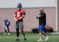 EAST RUTHERFORD, NEW JERSEY - JUNE 06: (L-R) Daniel Jones #8 and head coach Brian Daboll of the New York Giants during New York Giants OTA Offseason Workouts at NY Giants Quest Diagnostics Training Center on June 06, 2024 in East Rutherford, New Jersey.  (Photo by Luke Hales/Getty Images)