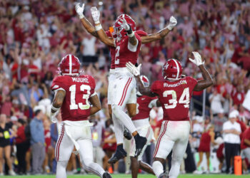 The Crimson Tide had plenty to celebrate after Zabien Brown's game-clinching interception against Georgia on Saturday night. (Kevin C. Cox/Getty Images)