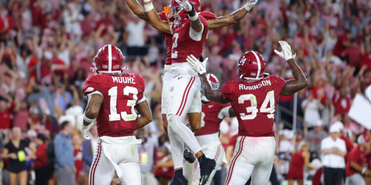 The Crimson Tide had plenty to celebrate after Zabien Brown's game-clinching interception against Georgia on Saturday night. (Kevin C. Cox/Getty Images)