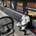 Chicago White Sox's Corey Julks sits in the end of the bench after the team's 5-3 loss to the New York Mets Saturday, Aug. 31, 2024, that saw the White Sox tie the franchise season record of 106 losses in Chicago. (AP Photo/Charles Rex Arbogast)