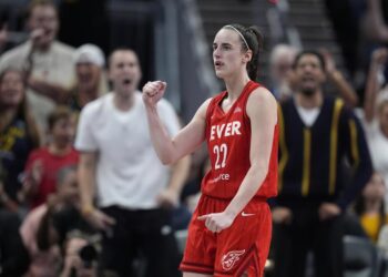 Indiana Fever's Caitlin Clark reacts during the second half of a WNBA basketball game against the Las Vegas Aces, Wednesday, Sept. 11, 2024, in Indianapolis. (AP Photo/Darron Cummings)