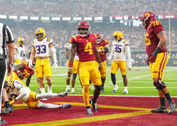 Sep 1, 2024; Paradise, Nevada, USA; Southern California Trojans running back Woody Marks (4) celebrates after scoring a touchdown against the LSU Tigers during the second quarter at Allegiant Stadium. Mandatory Credit: Stephen R. Sylvanie-USA TODAY Sports