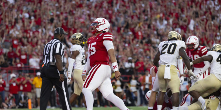 Nebraska quarterback Dylan Raiola (15) celebrates following a touchdown by Dante Dowdell, not pictured, during the first half of an NCAA college football game against Colorado, Saturday, Sept. 7, 2024, in Lincoln, Neb. (AP Photo/Rebecca S. Gratz)