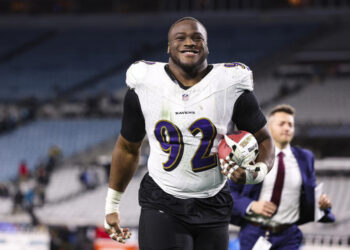 JACKSONVILLE, FL - DECEMBER 17: Justin Madubuike #92 of the Baltimore Ravens celebrates after an NFL football game against the Jacksonville Jaguars at EverBank Stadium on December 17, 2023 in Jacksonville, Florida. (Photo by Perry Knotts/Getty Images)