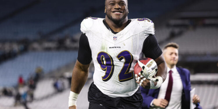 JACKSONVILLE, FL - DECEMBER 17: Justin Madubuike #92 of the Baltimore Ravens celebrates after an NFL football game against the Jacksonville Jaguars at EverBank Stadium on December 17, 2023 in Jacksonville, Florida. (Photo by Perry Knotts/Getty Images)