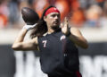 Utah quarterback Cameron Rising (7) warms up before an NCAA college football game against Oklahoma State Saturday, Sept. 21, 2024, in Stillwater, Okla. (AP Photo/Mitch Alcala)