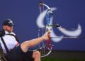 PARIS, FRANCE - SEPTEMBER 01: Matt Stutzman of Team United States competes against Nathan MacQueen of Team Great Britain in the Para Archery Men's Individual Compound Open Quarterfinal on day four of the Paris 2024 Summer Paralympic Games at Esplanade Des Invalides on September 01, 2024 in Paris, France. (Photo by Alex Davidson/Getty Images)