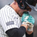 Anthony Rizzo #48 bites his hand after being hit by a pitch during the seventh inning of the game against the Pittsburgh Pirates. (Dustin Satloff/Getty Images)