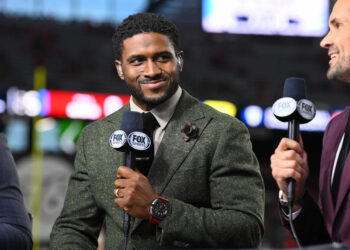 LAS VEGAS, NV - DECEMBER 02: Fox college football studio analyst Reggie Bush looks on before the Pac-12 Conference championship game between the Utah Utes and the USC Trojans at Allegiant Stadium on December 2, 2022 in Las Vegas, Nevada. (Photo by Brian Rothmuller/Icon Sportswire via Getty Images)