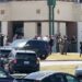 Law enforcement officers work at the scene of a shooting at Apalachee High School