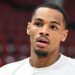 Dejounte Murray warms up before a game