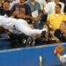 Derek Jeter dives into the stands