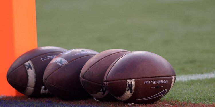 Footballs on field