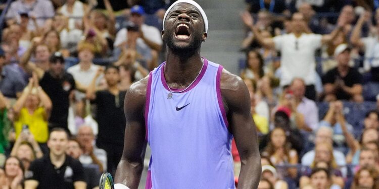 Frances Tiafoe reacts