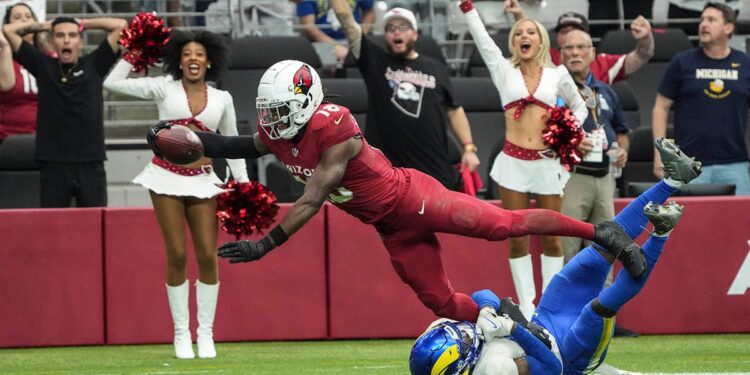 Marvin Harrison Jr. lunges for endzone