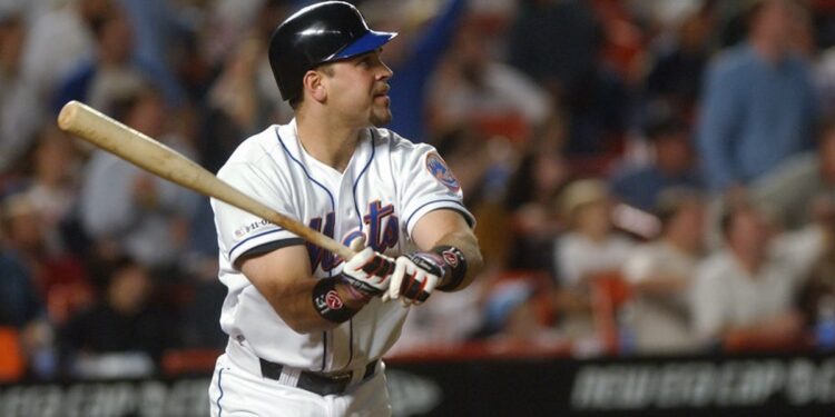 New York Mets' Mike Piazza hits an 8th inning homerun to lead the Mets past the Atlanta Braves, 3-2, on a patriotic and dramatic night at Shea Stadium as baseball returns to New York City.