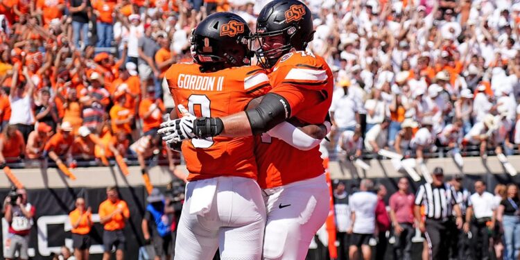 Ollie Gordon II celebrates with Preston Wilson