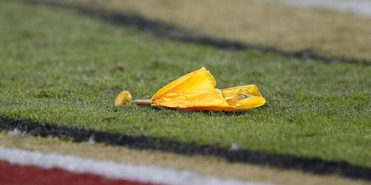 A yellow penalty flag