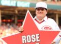 Pete Rose poses with retired number