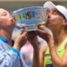 Jelena Ostapenko and Lyudmyla KIchenok celebrate