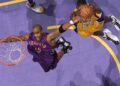 Vince Carter tries to grab the ball