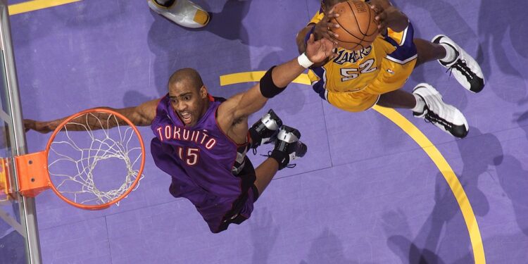 Vince Carter tries to grab the ball