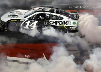 DARLINGTON, SOUTH CAROLINA - SEPTEMBER 01: Chase Briscoe, driver of the #14 HighPoint.com Ford, celebrates with a burnout after winning the NASCAR Cup Series Cook Out Southern 500 at Darlington Raceway on September 01, 2024 in Darlington, South Carolina. (Photo by Meg Oliphant/Getty Images)