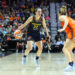 UNCASVILLE, CT - SEPTEMBER 22: Indiana Fever guard Caitlin Clark (22) defended by Connecticut Sun guard Marina Mabrey (4) during the First Round and game 1 of the 2024 WNBA playoffs between Indiana Fever and Connecticut Sun on September 22, 2024, at Mohegan Sun Arena in Uncasville, CT. (Photo by M. Anthony Nesmith/Icon Sportswire via Getty Images)