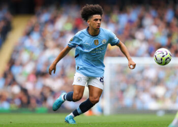 MANCHESTER, ENGLAND - SEPTEMBER 14: Rico Lewis of Manchester City during the Premier League match between Manchester City FC and Brentford FC at Etihad Stadium on September 14, 2024 in Manchester, England. (Photo by James Gill - Danehouse/Getty Images)