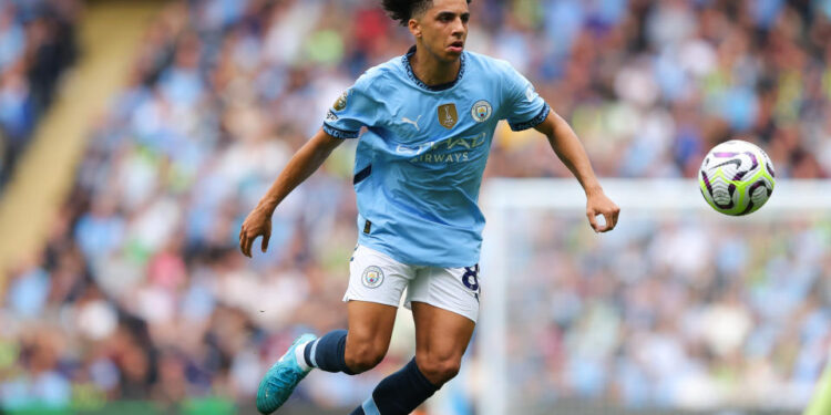 MANCHESTER, ENGLAND - SEPTEMBER 14: Rico Lewis of Manchester City during the Premier League match between Manchester City FC and Brentford FC at Etihad Stadium on September 14, 2024 in Manchester, England. (Photo by James Gill - Danehouse/Getty Images)