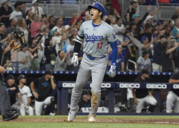 On Thursday in Miami, Shohei Ohtani hit his 49th and 50th home runs of the season, after stealing his 50th and 51st bases, to stand alone in MLB history. (AP Photo/Marta Lavandier)