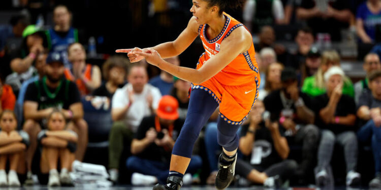 MINNEAPOLIS, MINNESOTA - SEPTEMBER 29: Alyssa Thomas #25 of the Connecticut Sun celebrates her basket against the Minnesota Lynx in the fourth quarter of Game One of the Semi-Finals during the WNBA Playoffs at Target Center on September 29, 2024 in Minneapolis, Minnesota. The Sun defeated the Lynx 73-70. (Photo by David Berding/Getty Images)