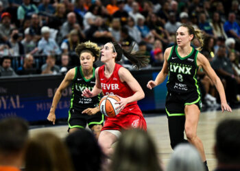 MINNEAPOLIS, MINNESOTA - AUGUST 24: Caitlin Clark #22 of the Indiana Fever drives with the ball in the second quarter of the game against the Minnesota Lynx at Target Center on August 24, 2024 in Minneapolis, Minnesota. NOTE TO USER: User expressly acknowledges and agrees that, by downloading and or using this photograph, User is consenting to the terms and conditions of the Getty Images License Agreement. (Photo by Stephen Maturen/Getty Images)