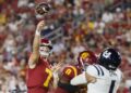 Los Angeles, CA - September 07: USC starting quarterback Miller Moss, #7, left.