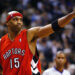 TORONTO - NOVEMBER 3:   Vince Carter #15 of the Toronto Raptors salutes the crowd after beating the Houston Rockets 95-88 during a game at the Air Canada Centre on November 3, 2003 in Toronto, Canada.  NOTE TO USER: User expressly acknowledges and agrees that, by downloading and or using this photograph, User is consenting to the terms and conditions of the Getty Images License Agreement. (Photo by Dave Sandford/Getty Images)