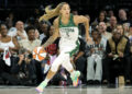 LAS VEGAS, NEVADA - SEPTEMBER 22: Gabby Williams #5 of the Seattle Storm brings the ball up the court against the Las Vegas Aces in the first quarter of Game One of the 2024 WNBA Playoffs first round at Michelob ULTRA Arena on September 22, 2024 in Las Vegas, Nevada. The Aces defeated the Storm 78-67. NOTE TO USER: User expressly acknowledges and agrees that, by downloading and or using this photograph, User is consenting to the terms and conditions of the Getty Images License Agreement. (Photo by Ethan Miller/Getty Images)