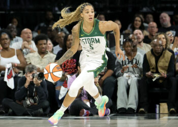 LAS VEGAS, NEVADA - SEPTEMBER 22: Gabby Williams #5 of the Seattle Storm brings the ball up the court against the Las Vegas Aces in the first quarter of Game One of the 2024 WNBA Playoffs first round at Michelob ULTRA Arena on September 22, 2024 in Las Vegas, Nevada. The Aces defeated the Storm 78-67. NOTE TO USER: User expressly acknowledges and agrees that, by downloading and or using this photograph, User is consenting to the terms and conditions of the Getty Images License Agreement. (Photo by Ethan Miller/Getty Images)